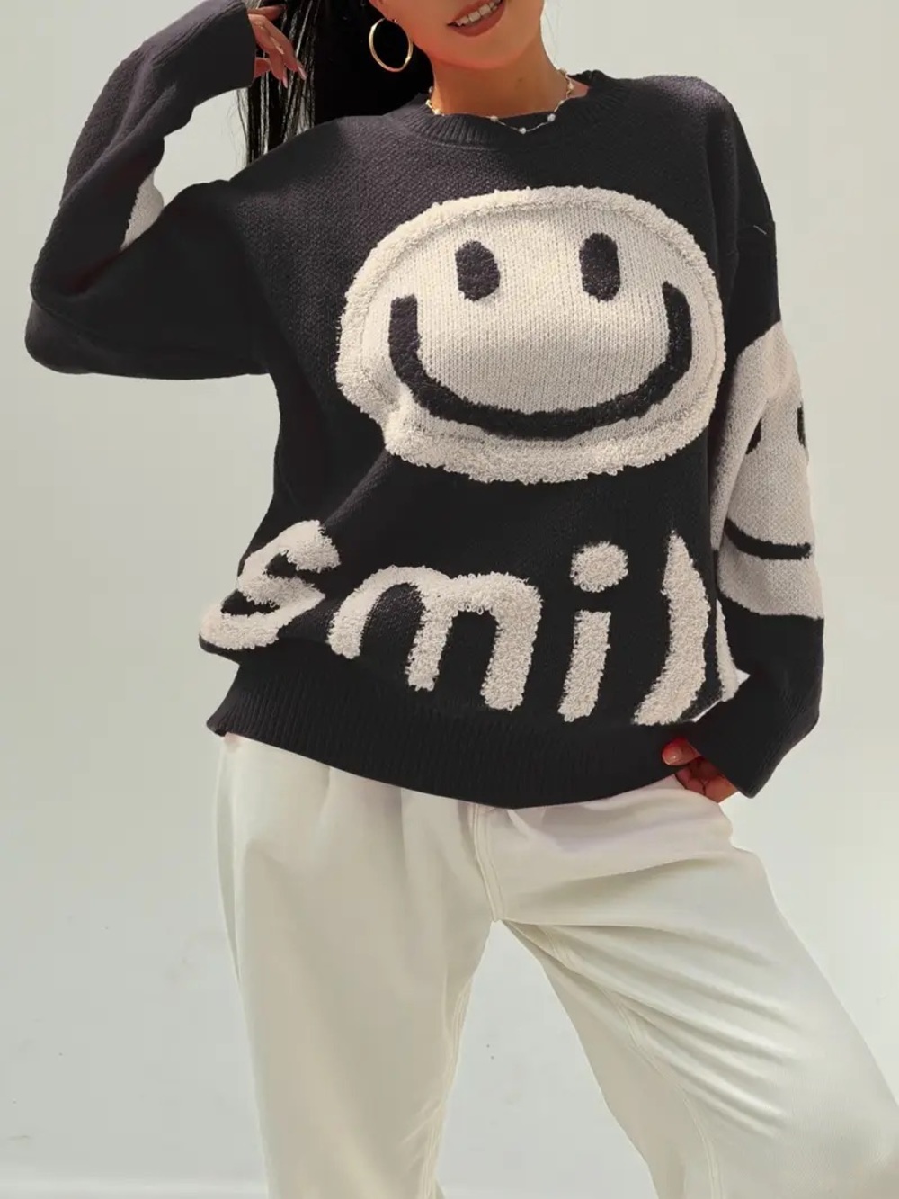 Daisy Black Crewneck Sweater with White Smiley Graphic